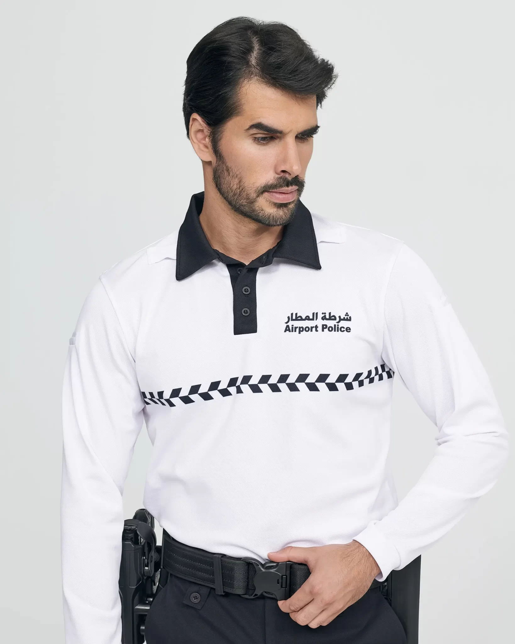 uniformes policía de aeropuerto Qatar polo manga larga